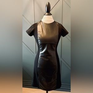 Danier Black Leather Bodycon T-Shirt Dress. Fabric side panels. Size 4.